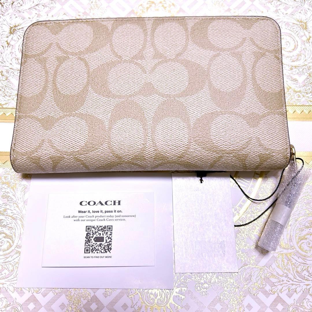 COACH シグネチャー ラウンドジップ 長財布 PVCコーティング