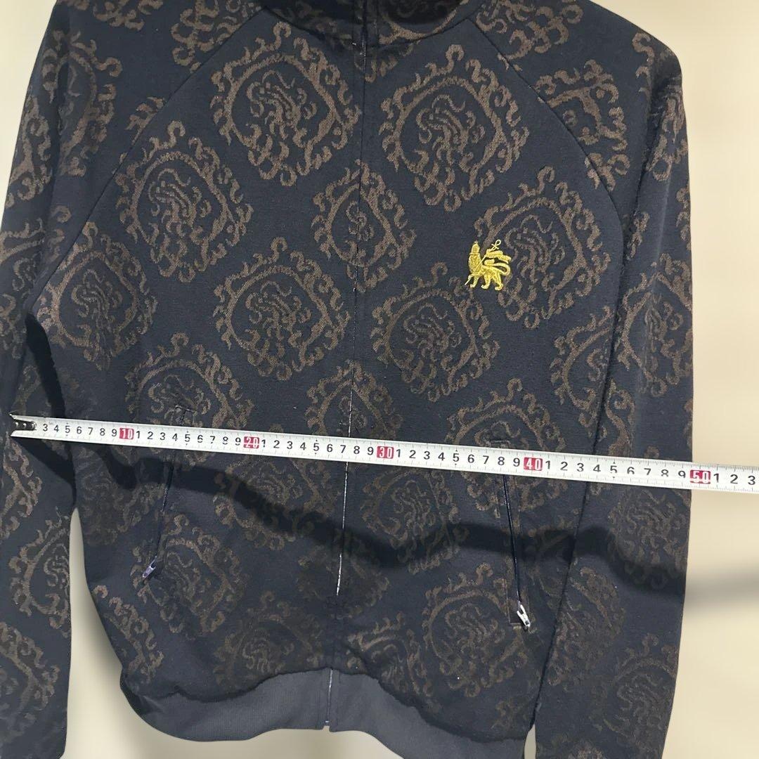 g*1様 サスクワッチファブリックスCURLED UP DRAGON トラックジ