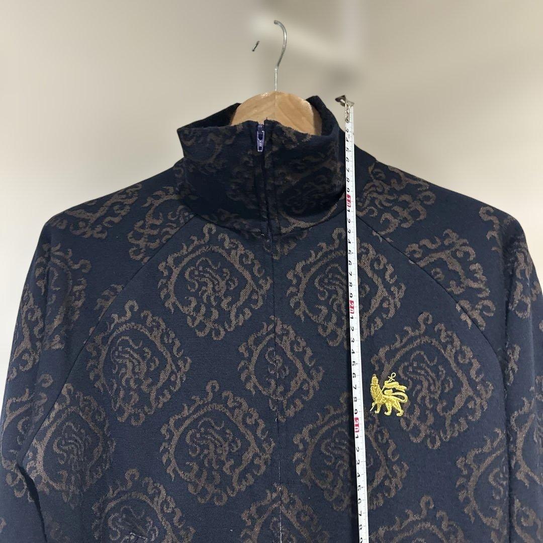 g*1様 サスクワッチファブリックスCURLED UP DRAGON トラックジ