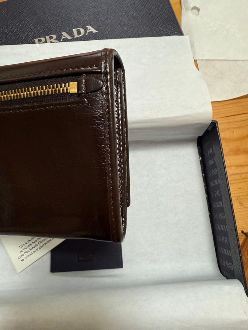 にゅんさん⭐︎PRADA ソフトルックスレザー 長財布　ダークブラウン