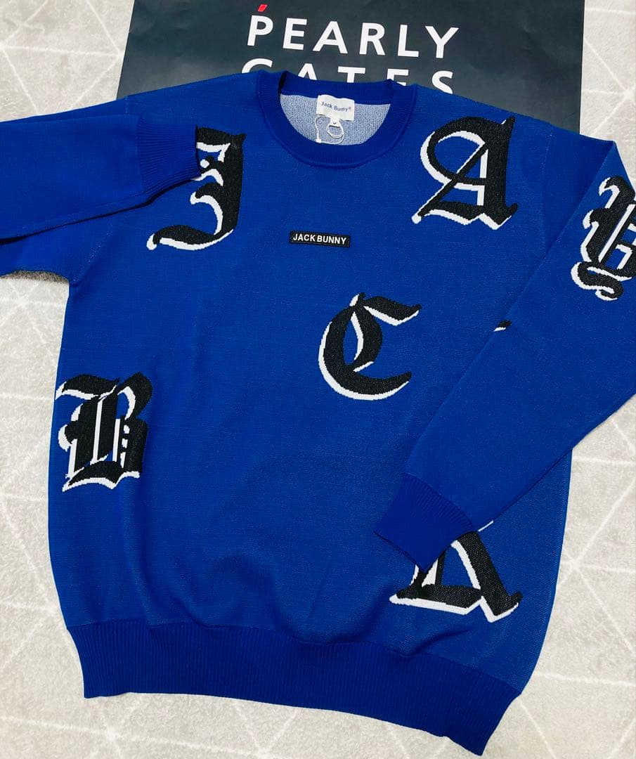 新品 パーリーゲイツ ジャックバニー ゴシックロゴWジャガードニット(6)LL青