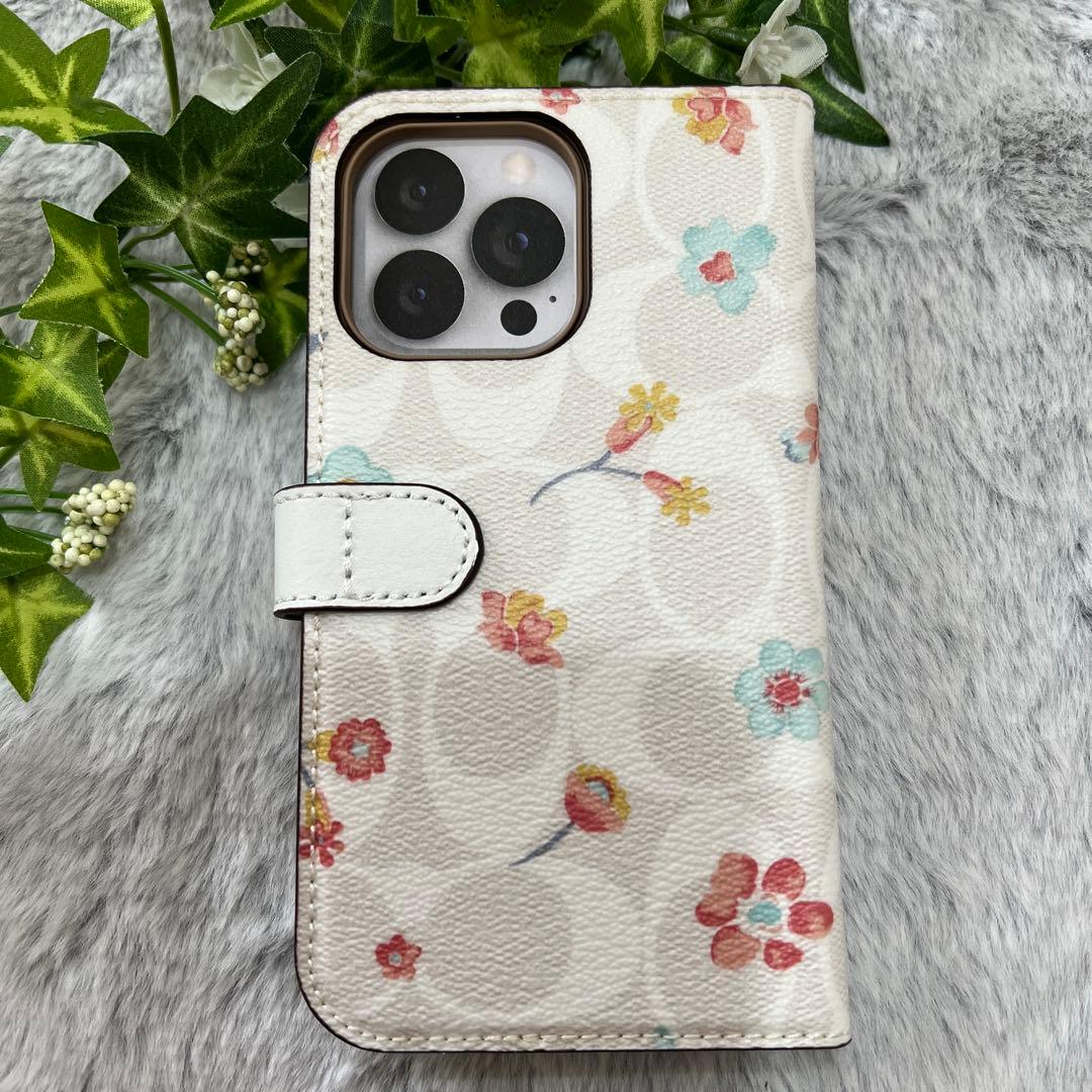 【新品未使用】iPhone13pro【COACH】2way手帳型ケース★花柄／白