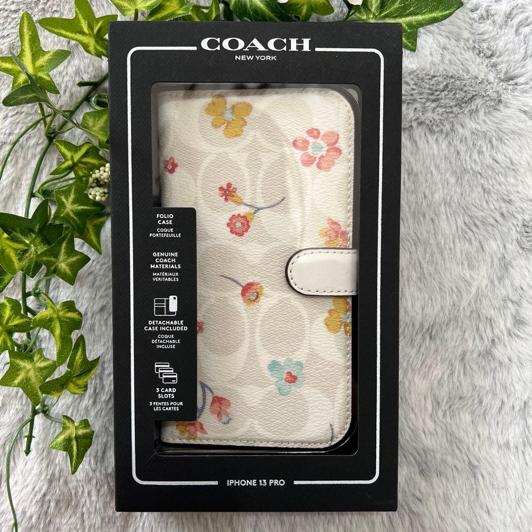 【新品未使用】iPhone13pro【COACH】2way手帳型ケース★花柄／白