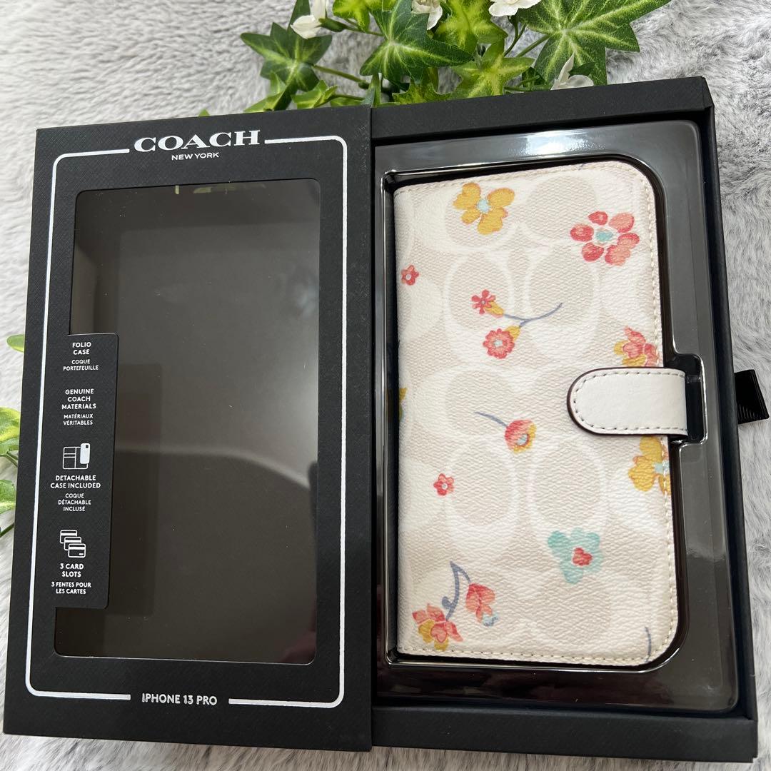 【新品未使用】iPhone13pro【COACH】2way手帳型ケース★花柄／白
