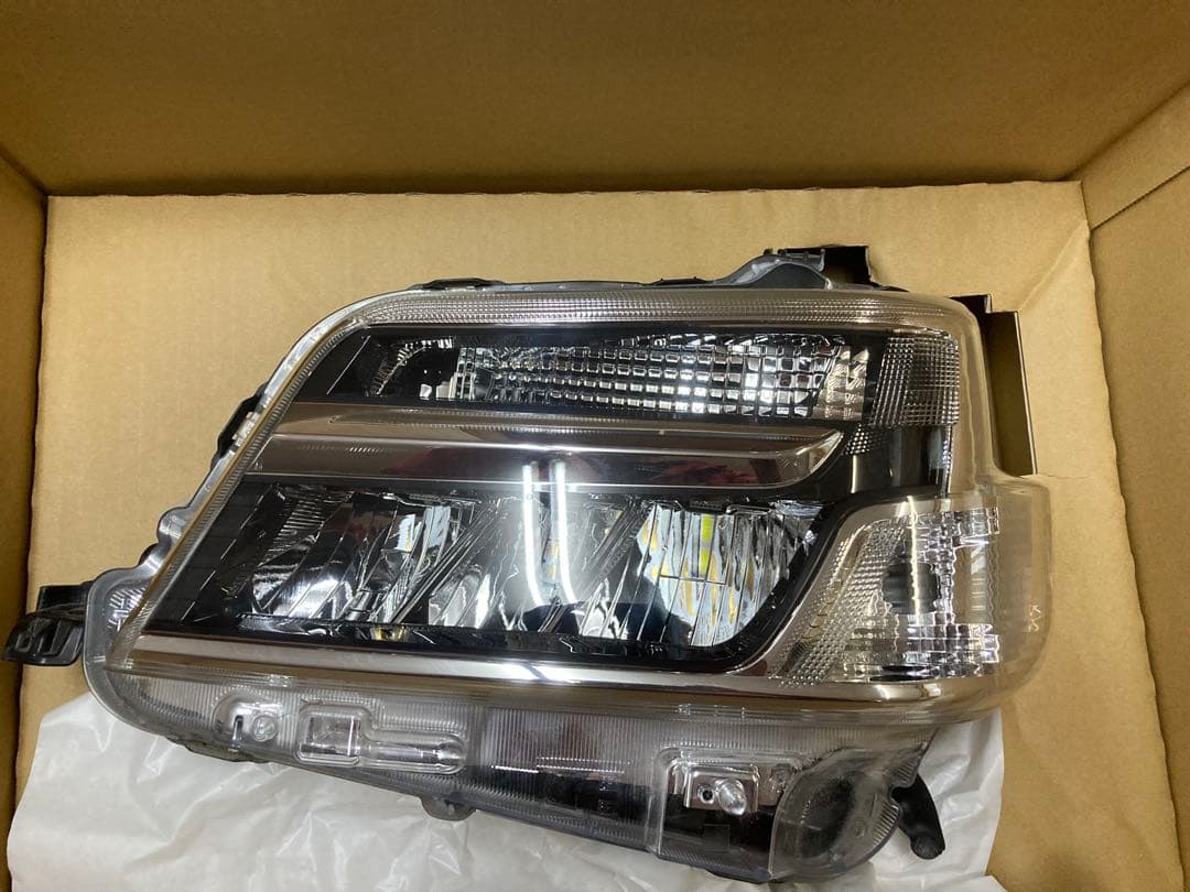 ハイゼットカーゴＳ331Ｖ　左ヘッドライト