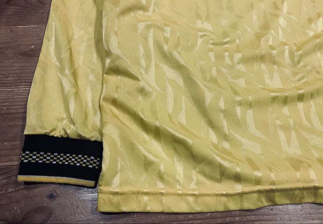 ユニフォーム 古着 90s Bukta バクタ UK製 黄色 Vネック 40