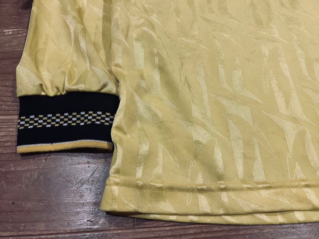 ユニフォーム 古着 90s Bukta バクタ UK製 黄色 Vネック 40