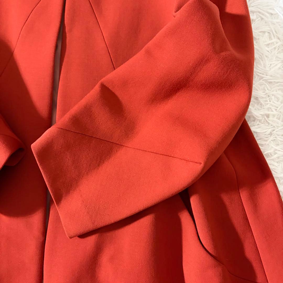 美品 シビラ ノーカラーコート 袖変形 フレア くるみボタン オレンジ