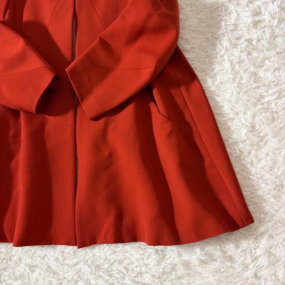 美品 シビラ ノーカラーコート 袖変形 フレア くるみボタン オレンジ