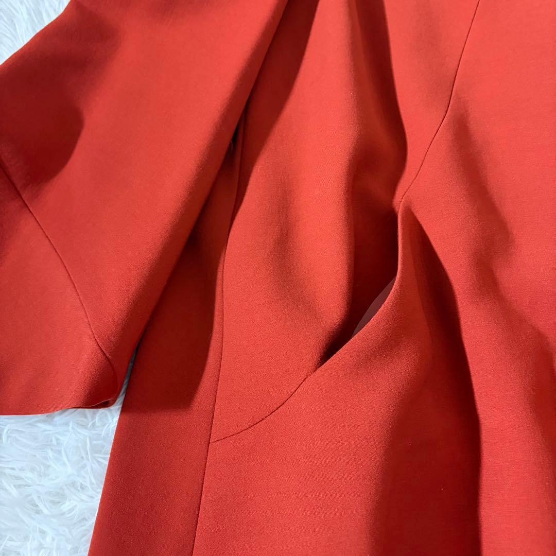 美品 シビラ ノーカラーコート 袖変形 フレア くるみボタン オレンジ