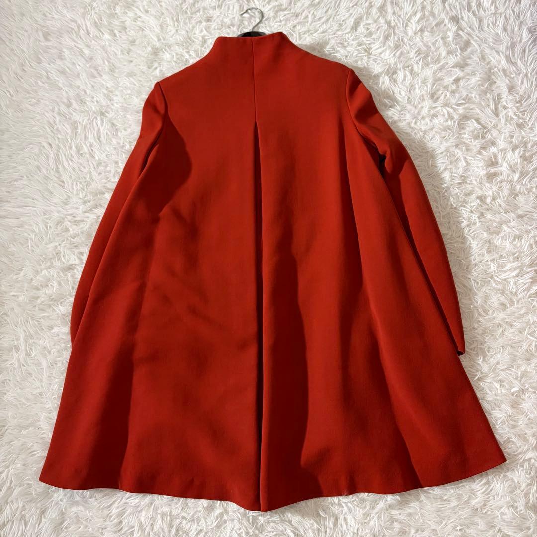 美品 シビラ ノーカラーコート 袖変形 フレア くるみボタン オレンジ