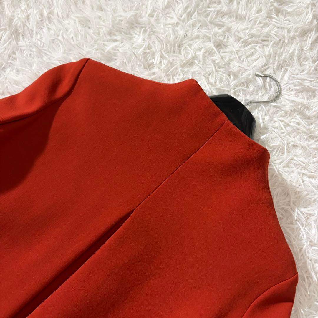 美品 シビラ ノーカラーコート 袖変形 フレア くるみボタン オレンジ