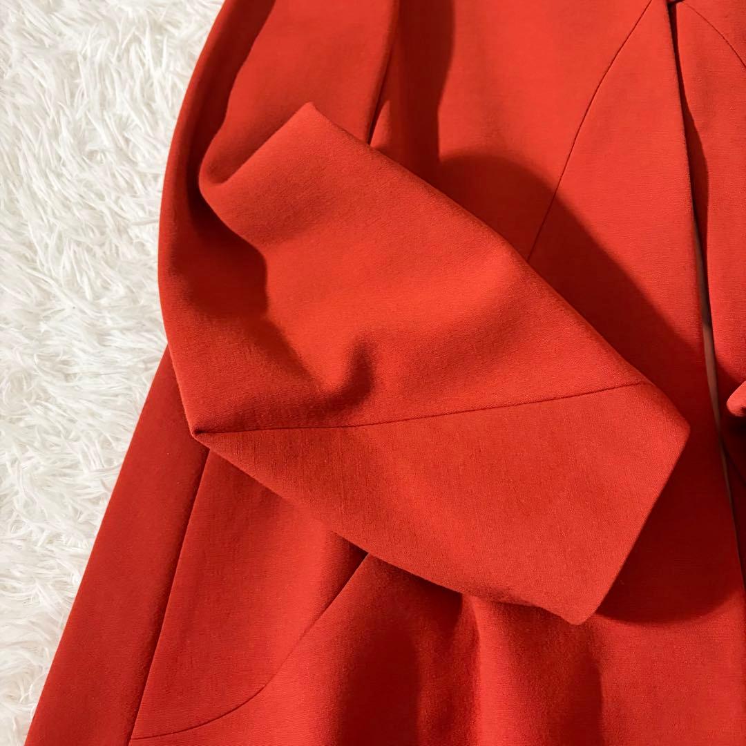 美品 シビラ ノーカラーコート 袖変形 フレア くるみボタン オレンジ