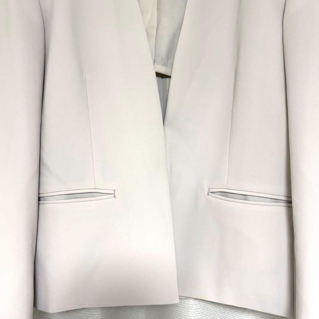 23区 トリアセダブルジョーゼット ノーカラージャケット 40 L ベージュ