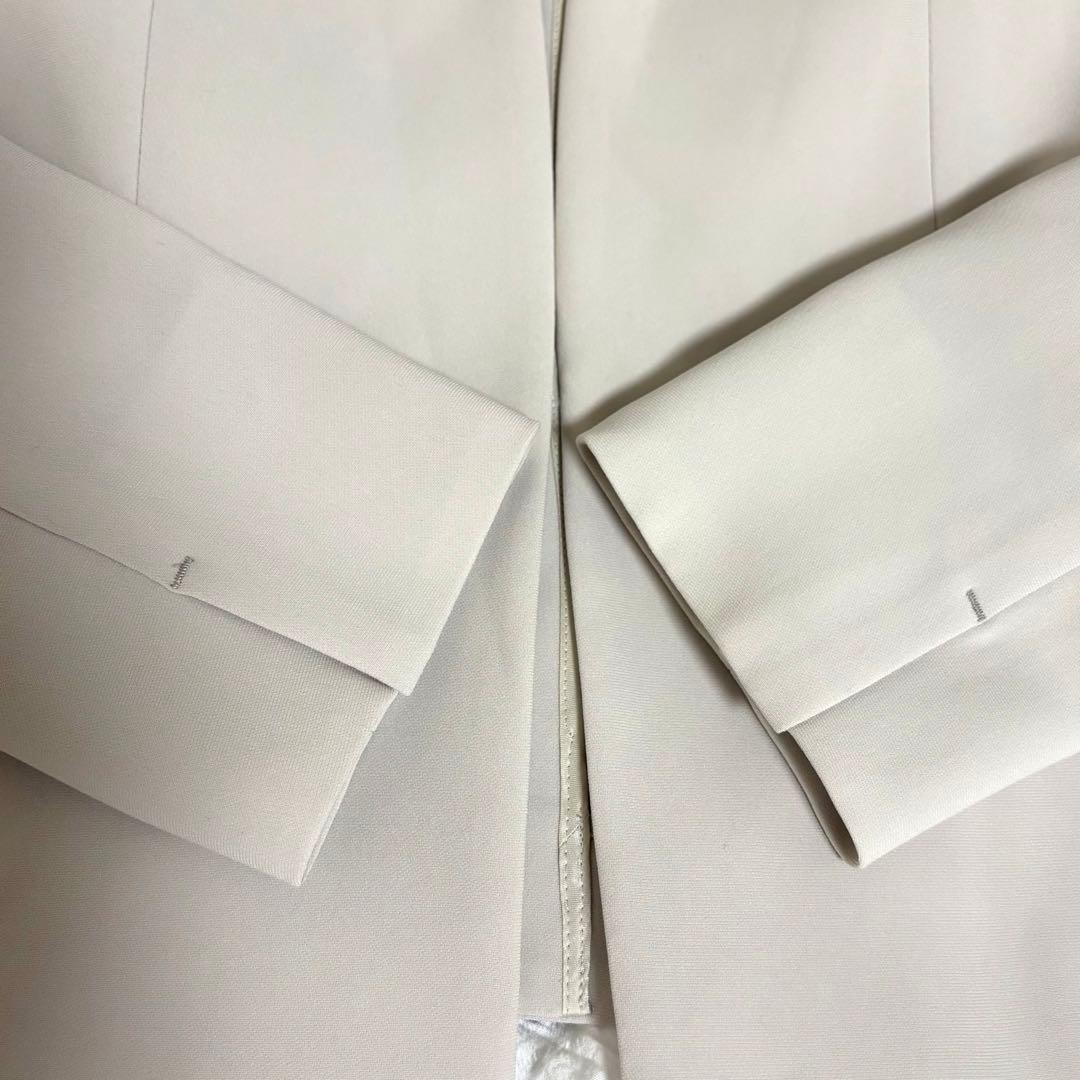 23区 トリアセダブルジョーゼット ノーカラージャケット 40 L ベージュ