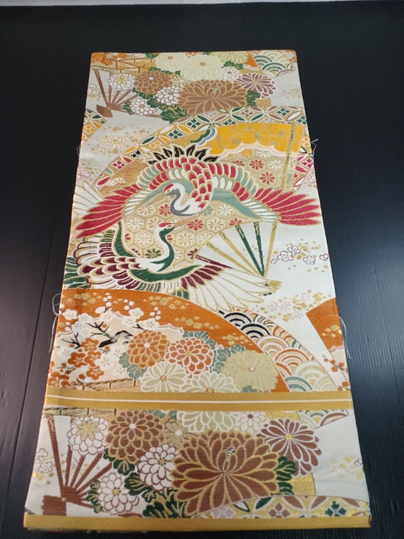 ［丸帯］新品未使用品　経年劣化でのシミが有り O-440