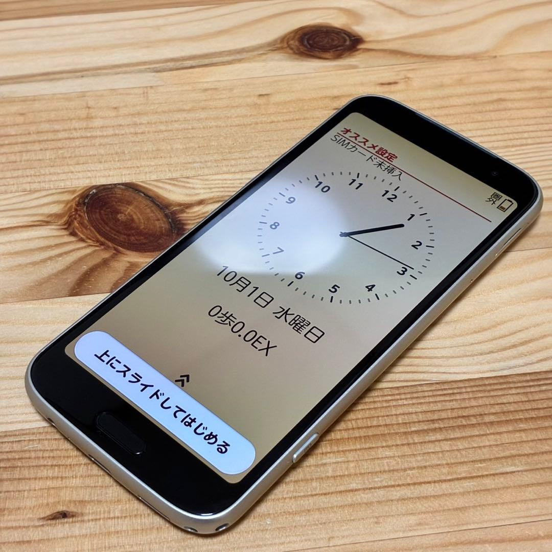 まつ　らくらくスマートフォン　F-53E ゴールド　317000a