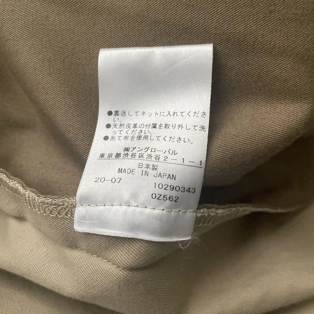 ベージュ トレンチコート ボタン留め ベルト付き