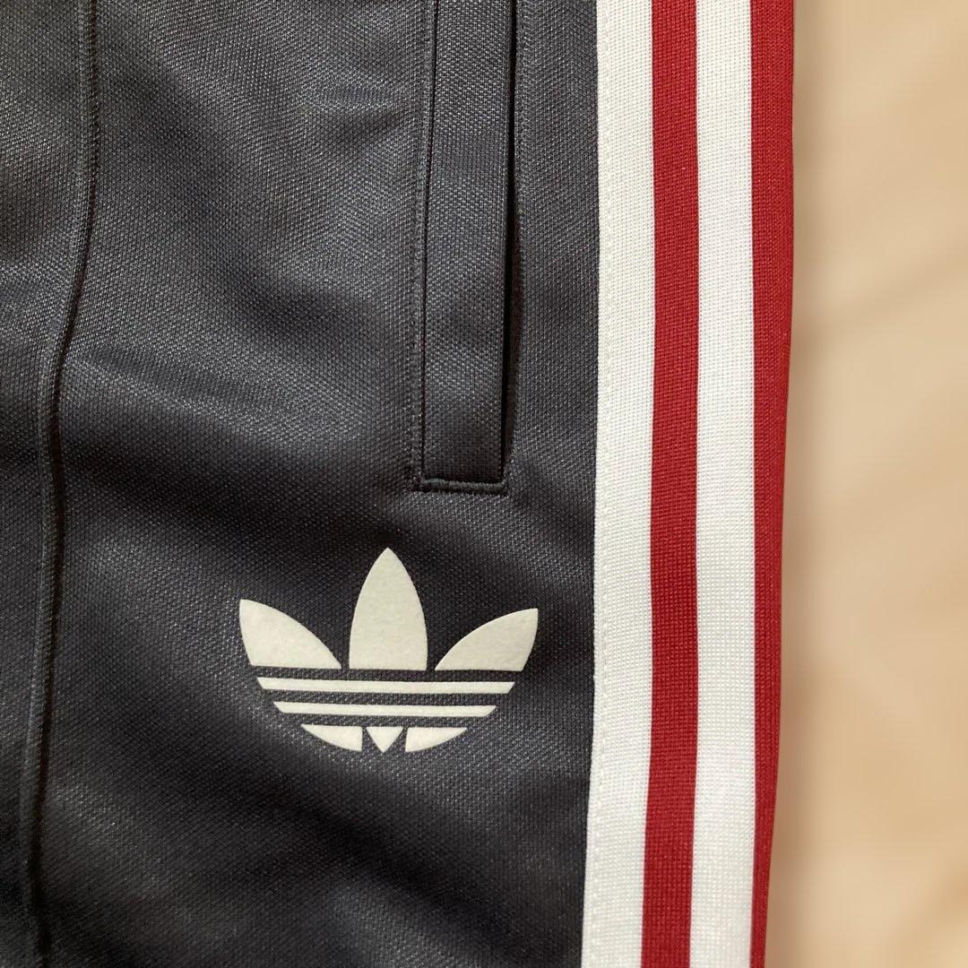 新品未使用タグ付き‼︎マンチェスター×adidasトラックパンツ　ジャージLサイズ