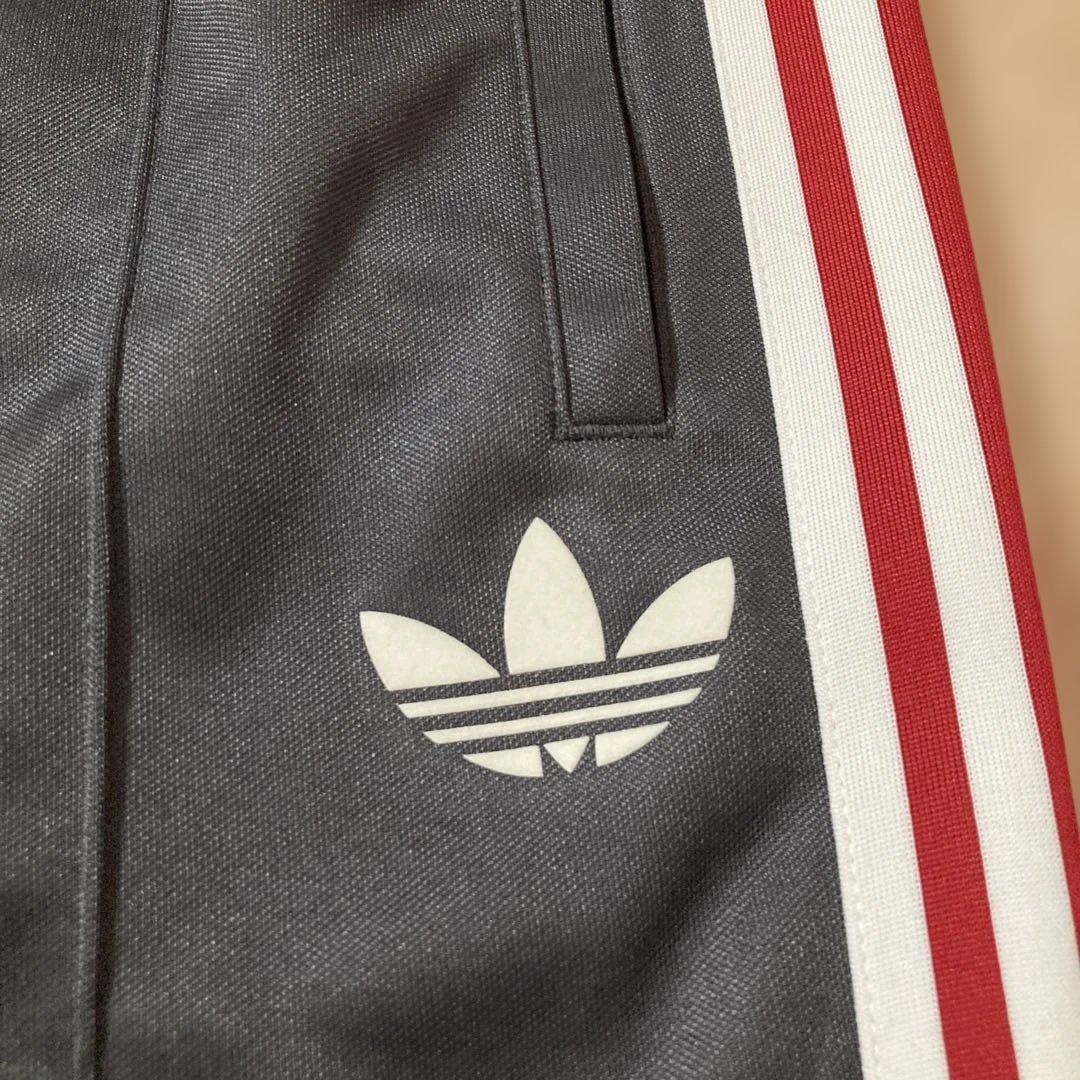 新品未使用タグ付き‼︎マンチェスター×adidasトラックパンツ　ジャージLサイズ