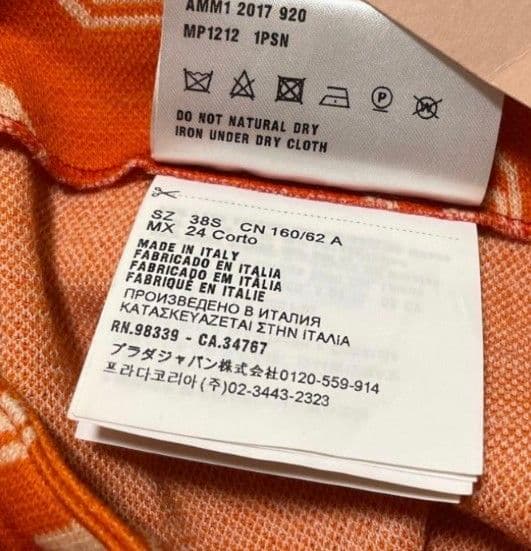 大特価【美品】ミュウミュウの総柄フレアパンツ　オレンジ系