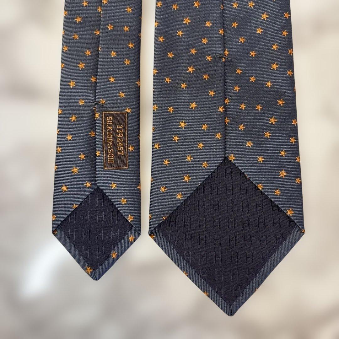 【極美品✨】HERMES ネクタイ　ネイビー　紺　オレンジ　スター　星　刺繍