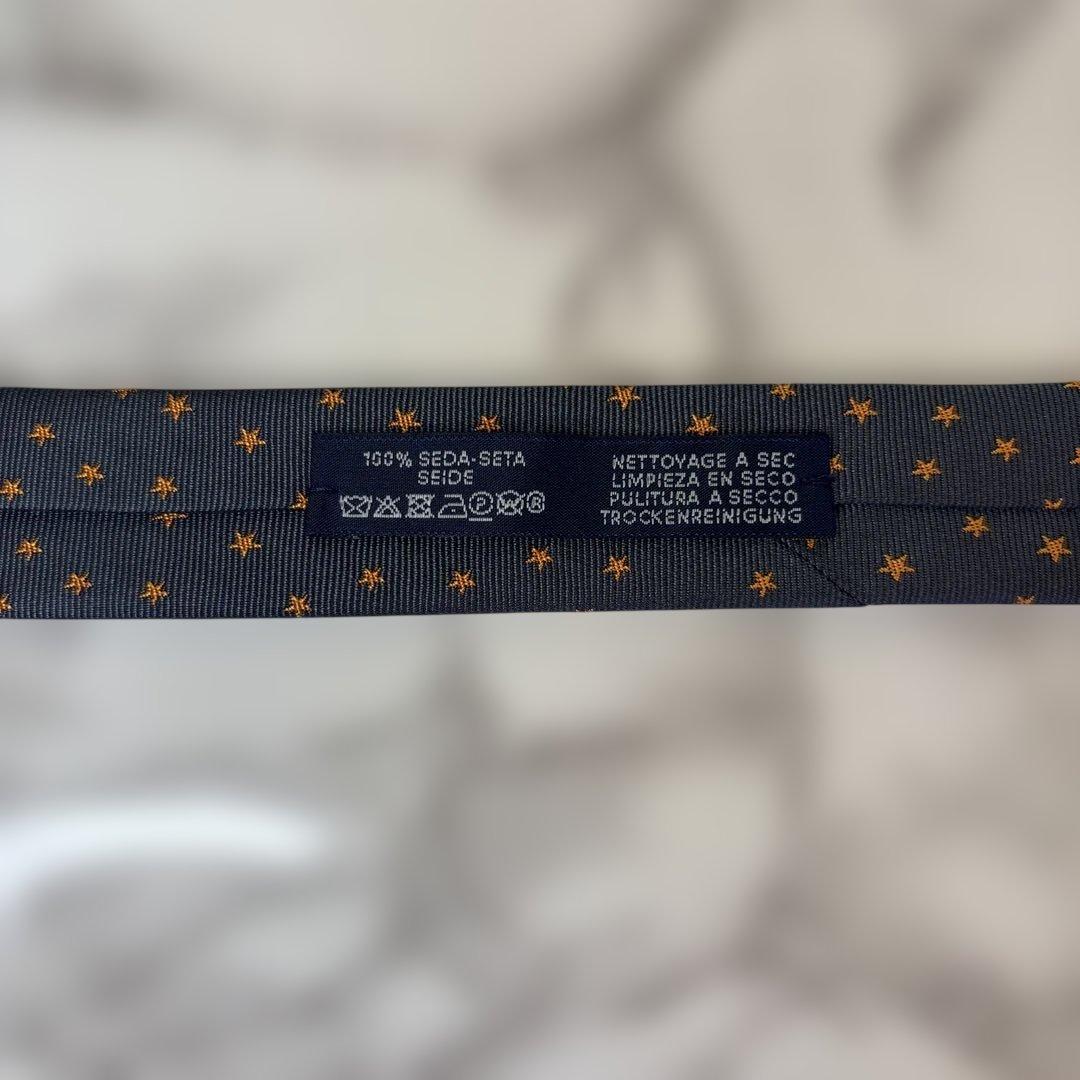 【極美品✨】HERMES ネクタイ　ネイビー　紺　オレンジ　スター　星　刺繍