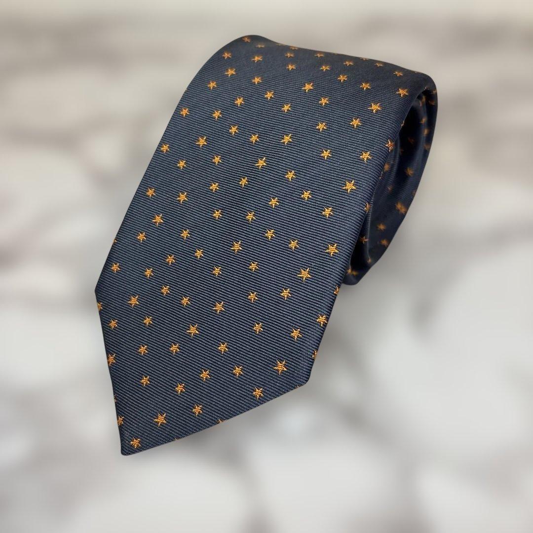 【極美品✨】HERMES ネクタイ　ネイビー　紺　オレンジ　スター　星　刺繍