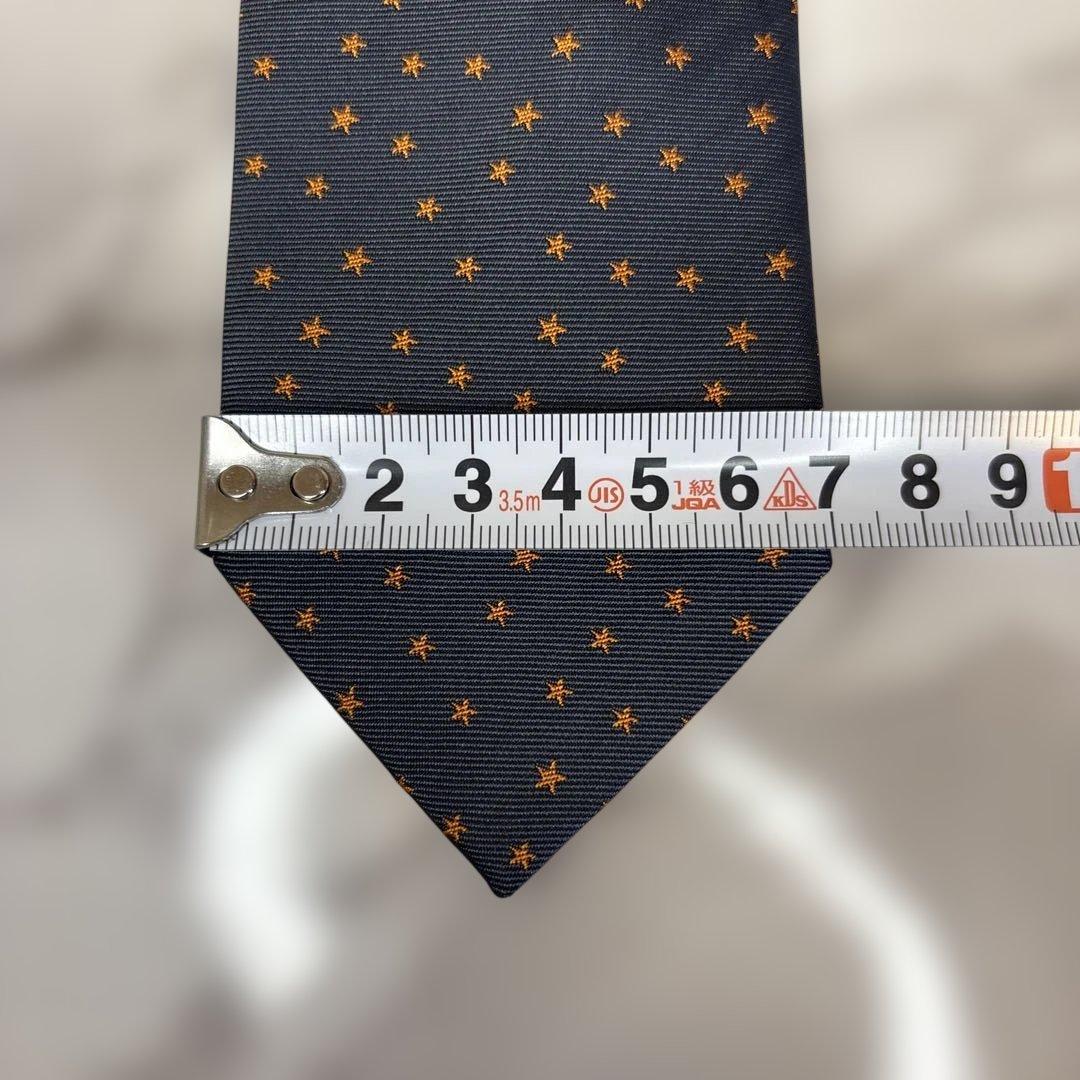 【極美品✨】HERMES ネクタイ　ネイビー　紺　オレンジ　スター　星　刺繍