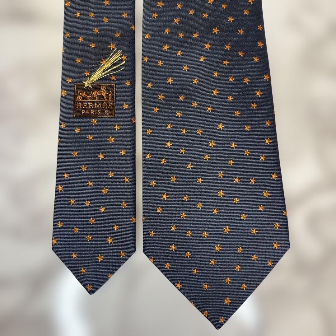 【極美品✨】HERMES ネクタイ　ネイビー　紺　オレンジ　スター　星　刺繍