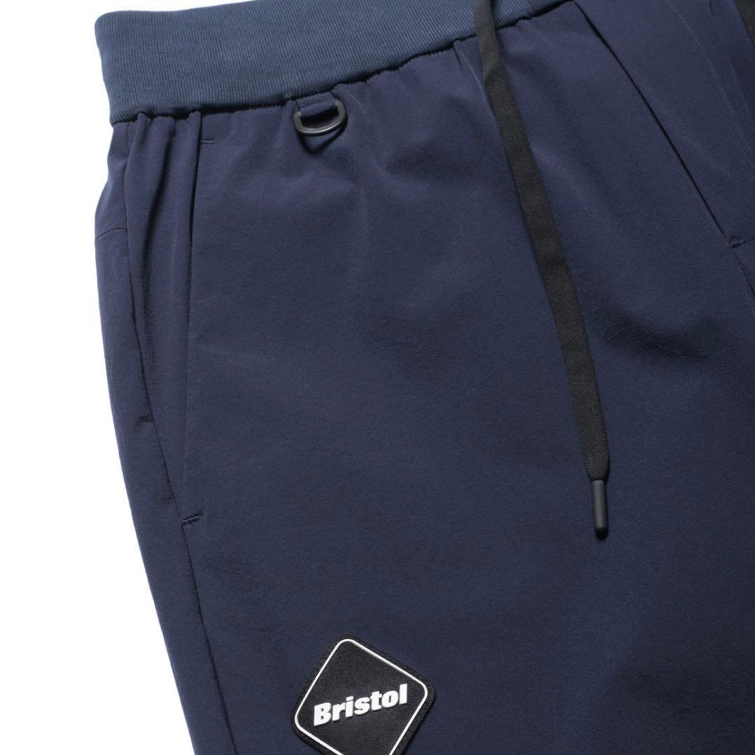 新品 4WAY STRETCH RIBBED PANTS ネイビー L