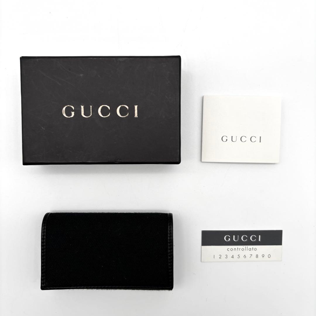 未使用保管品 グッチ 6連 キーケース GG キャンバス レザー メンズ 黒
