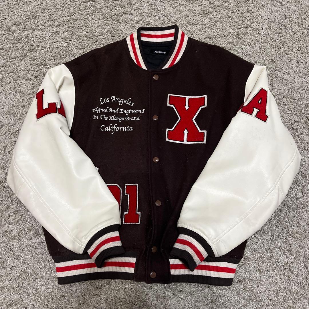 XLARGE ダークブラウン スタジャン Ｍ 袖に汚れあり　毛玉あり