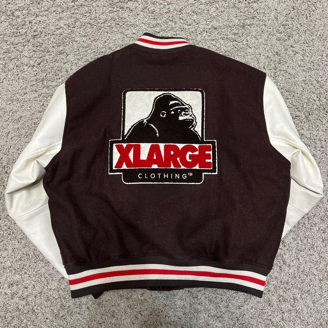 XLARGE ダークブラウン スタジャン Ｍ 袖に汚れあり　毛玉あり