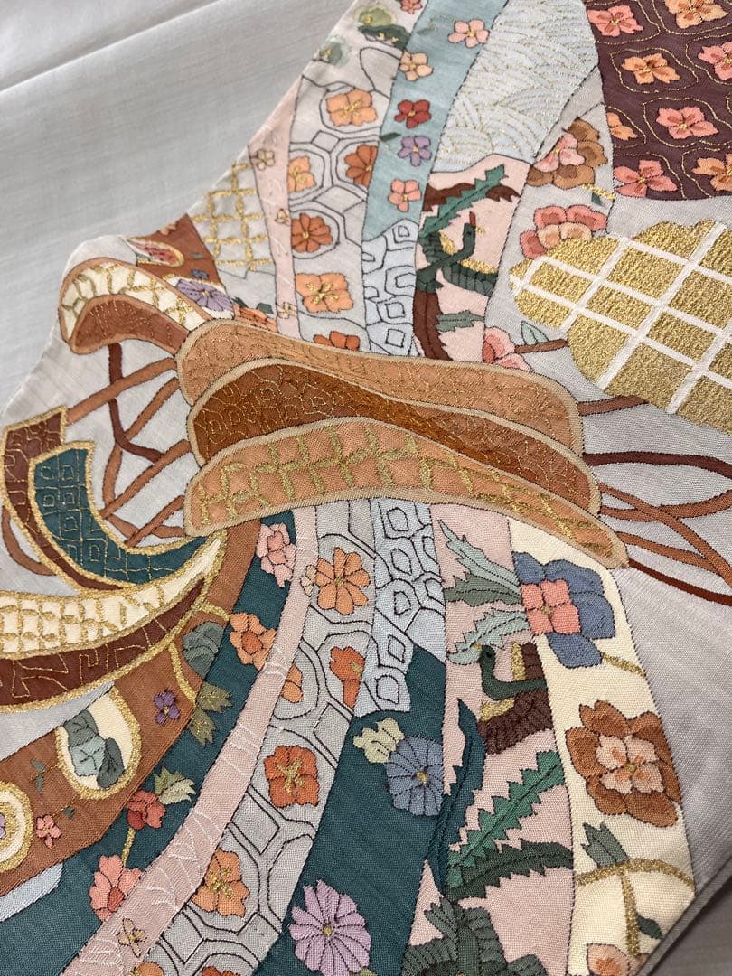 仕立て上がり新品袋帯　薄いグレーに鶴松花宝尽くしなどおめでたい柄　とても可愛い