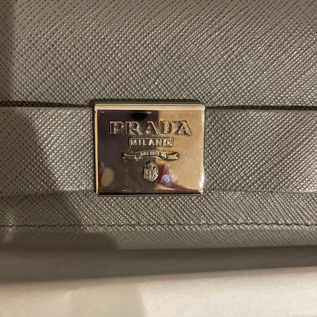 ◉PRADA プラダ　長財布 サフィアーノ　レザー リボン グレー