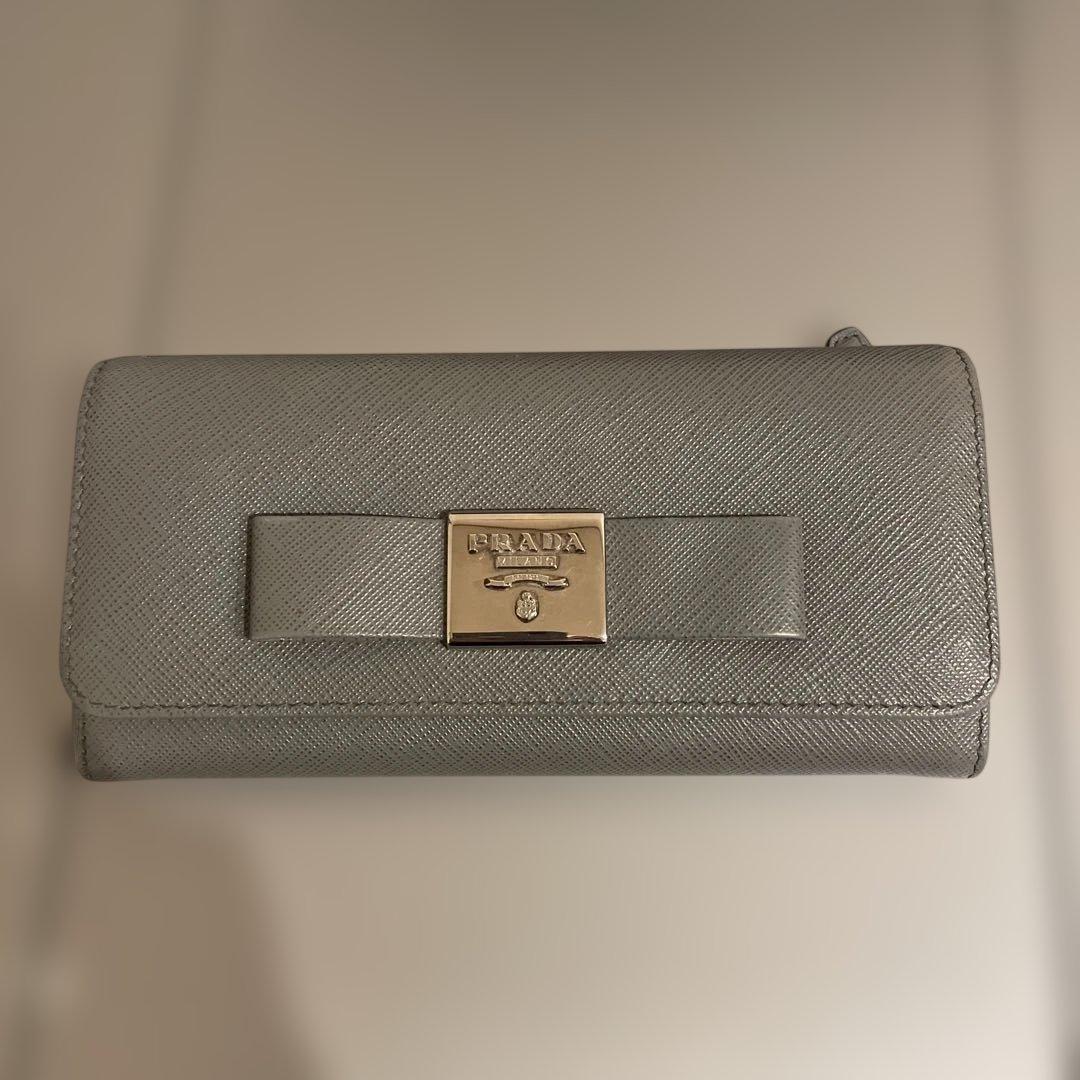 ◉PRADA プラダ　長財布 サフィアーノ　レザー リボン グレー