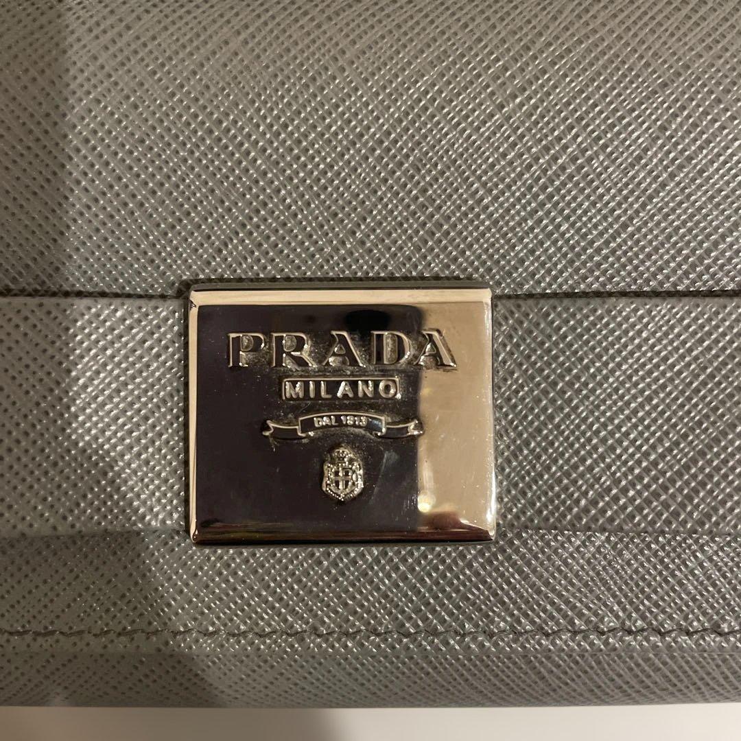 ◉PRADA プラダ　長財布 サフィアーノ　レザー リボン グレー
