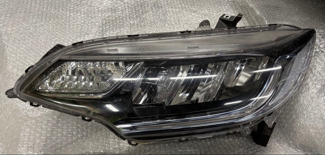 GP5 ヘッドライト左