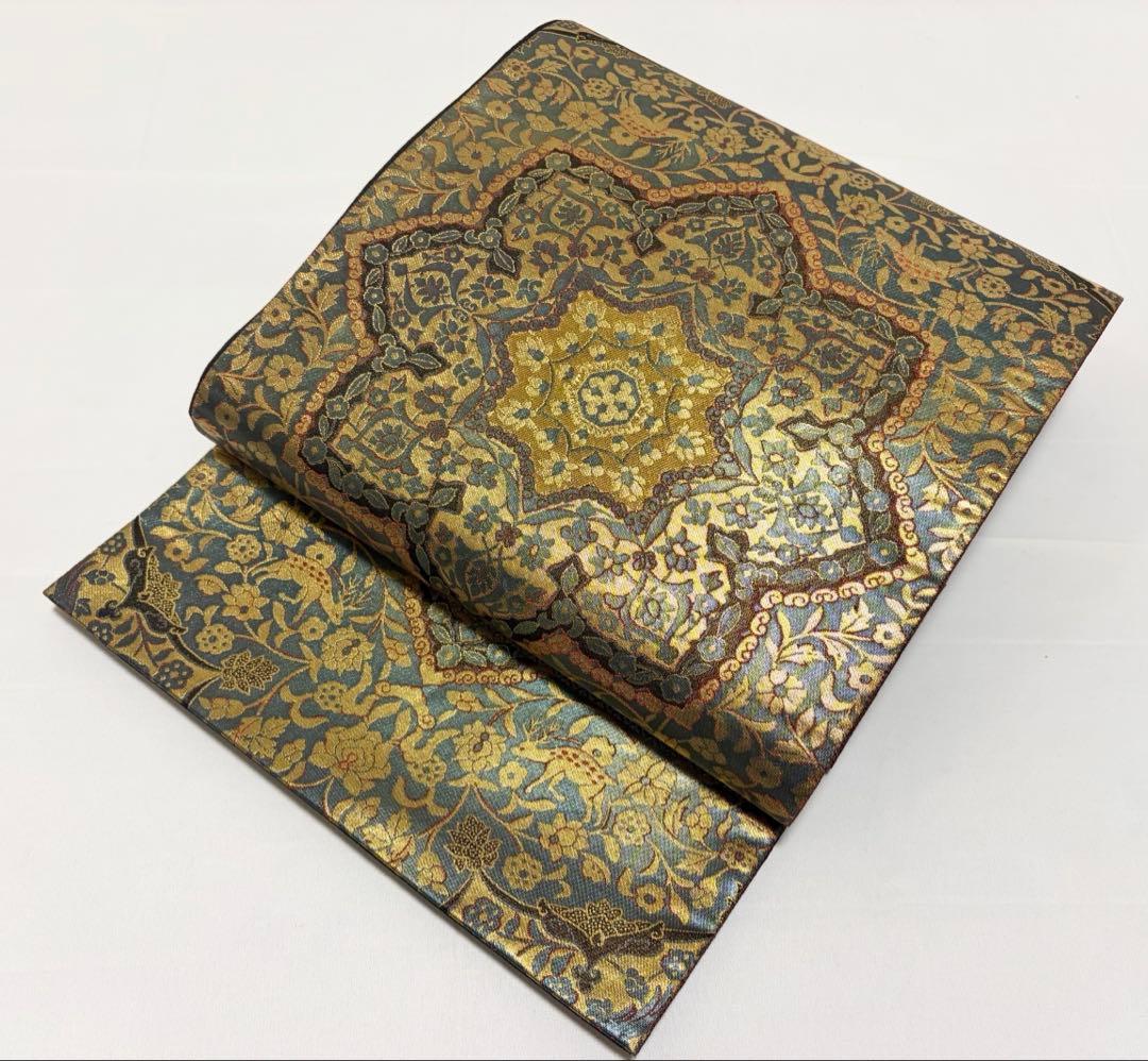 C 西陣 服部織物 本金箔 純金箔 こはく錦 イタリア更紗 唐草唐花 華文 袋帯