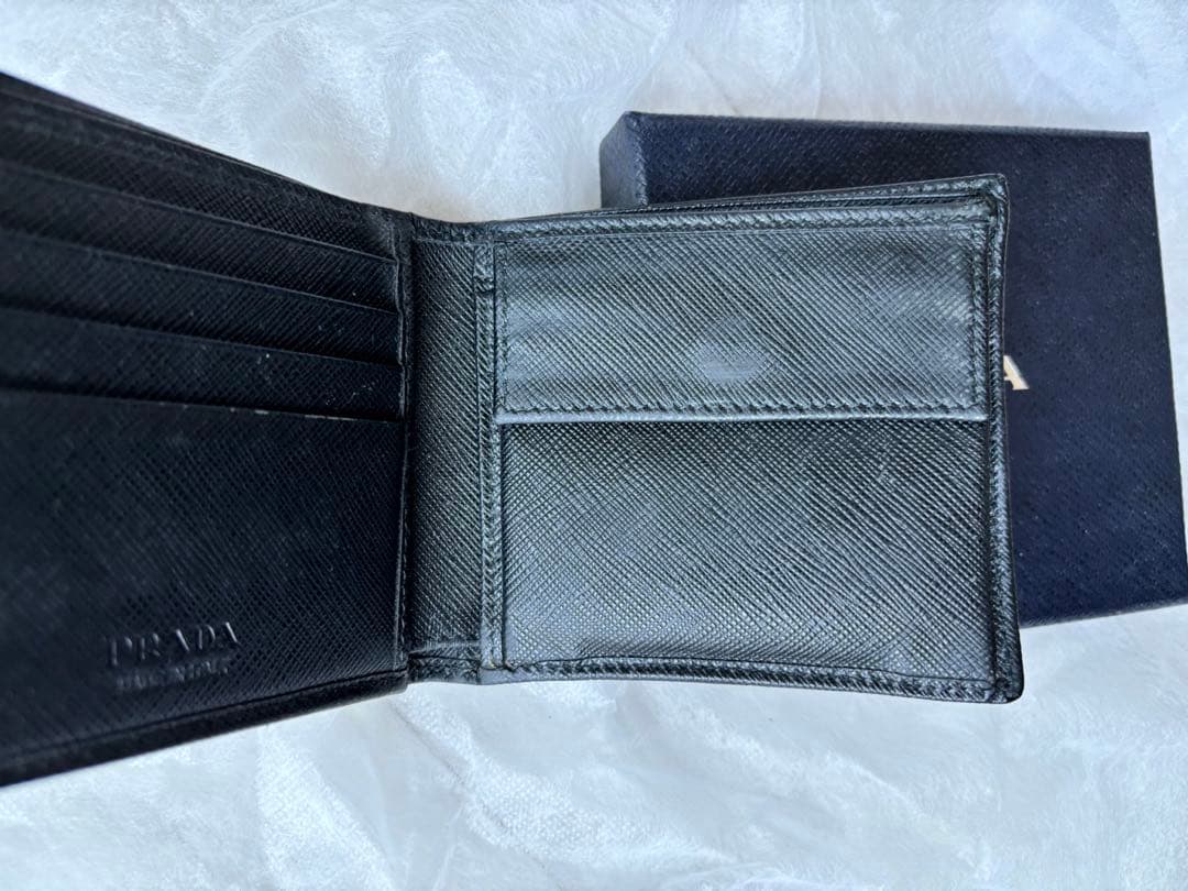種*様 【特別セール中】プラダ　二つ折り財布　定価65,800円