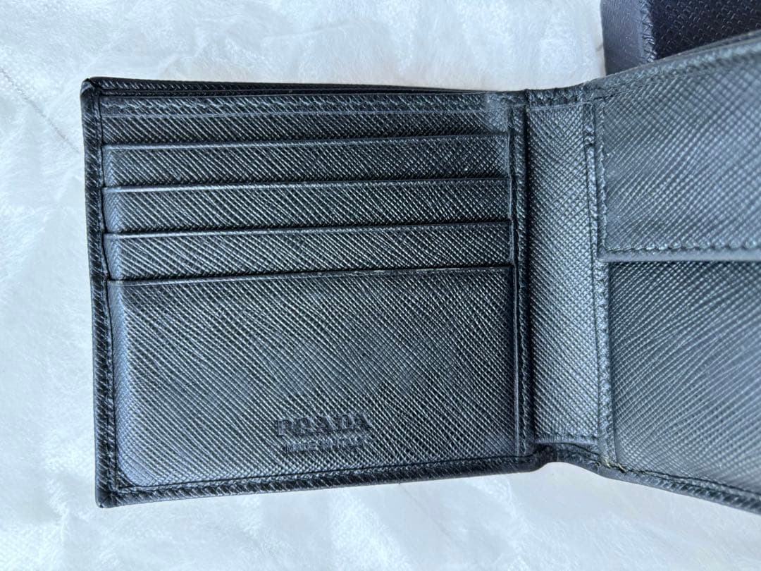 種*様 【特別セール中】プラダ　二つ折り財布　定価65,800円