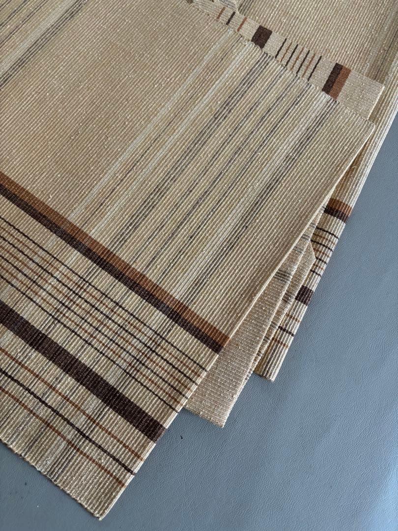 〈お楽しみ価格〉正絹 真綿紬 八寸名古屋帯 薄辛子ベージュ 変わり格子絣