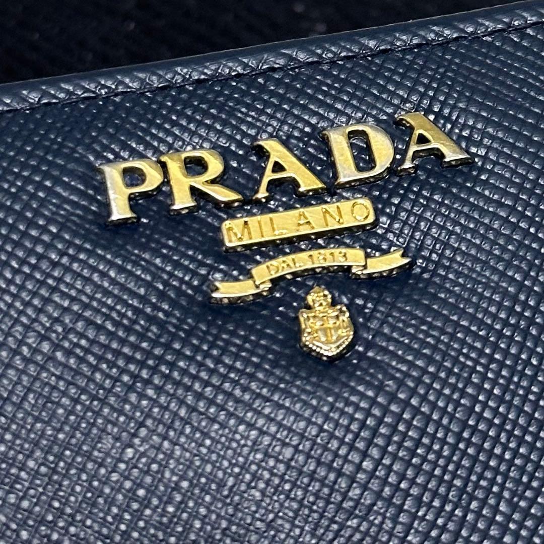 PRADA プラダ　折り財布　ラウンドファスナー　ブルー　ゴールロゴ