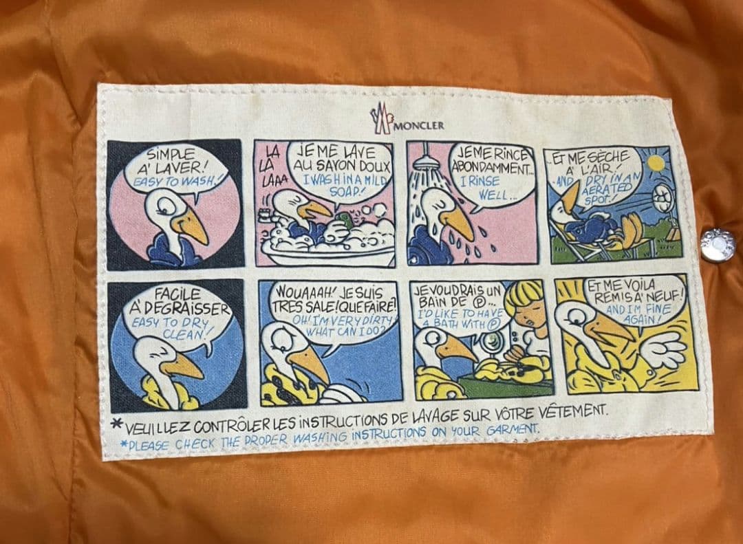 MONCLER オレンジ ダウンベスト アニメーションタグ