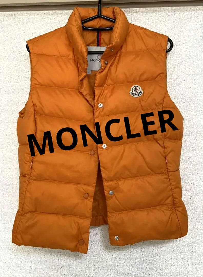 MONCLER オレンジ ダウンベスト アニメーションタグ