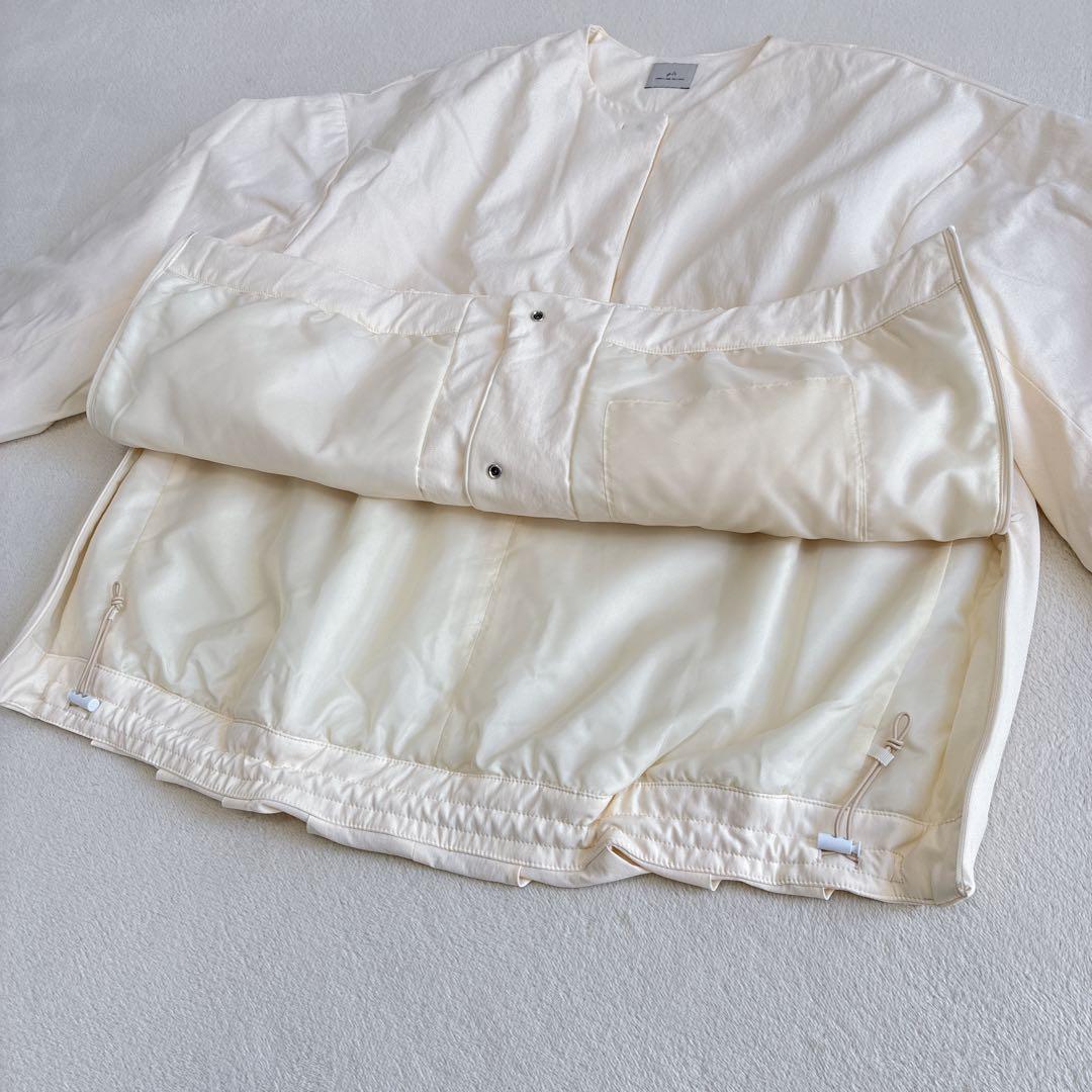 グリーンレーベルリラクシング　パフィー ノーカラー ブルゾン 撥水 保温性