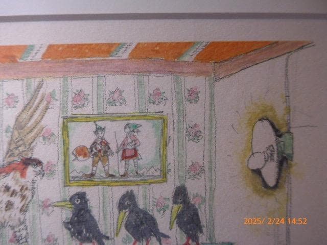 絵本のような世界観を持った作家のエッチングです。手彩色がされています