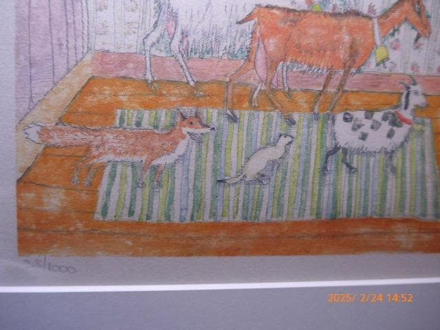 絵本のような世界観を持った作家のエッチングです。手彩色がされています