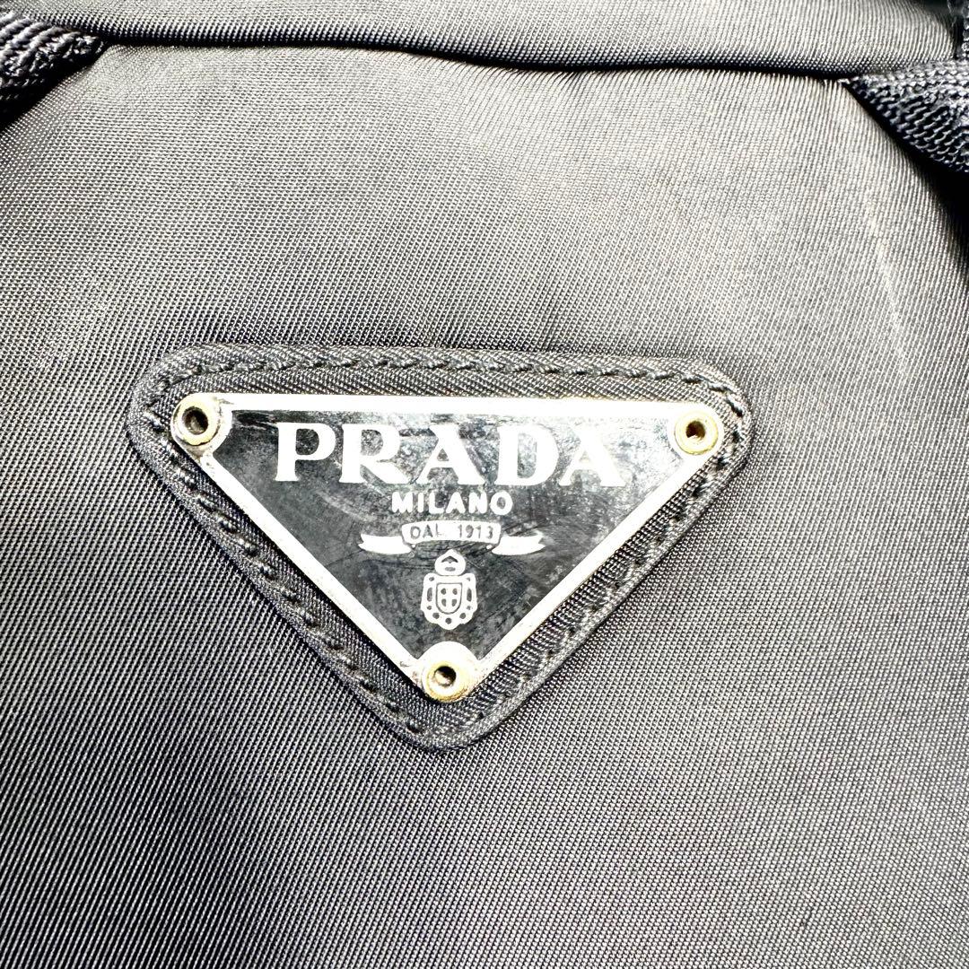 PRADA リュック ナイロン 三角 プレート 巾着 マルチポケット レザー